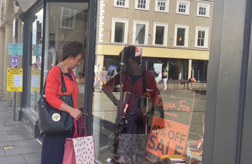 Jo looking in shop window