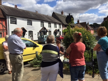 Jo Churchill MP speaking with residents in Woolpit